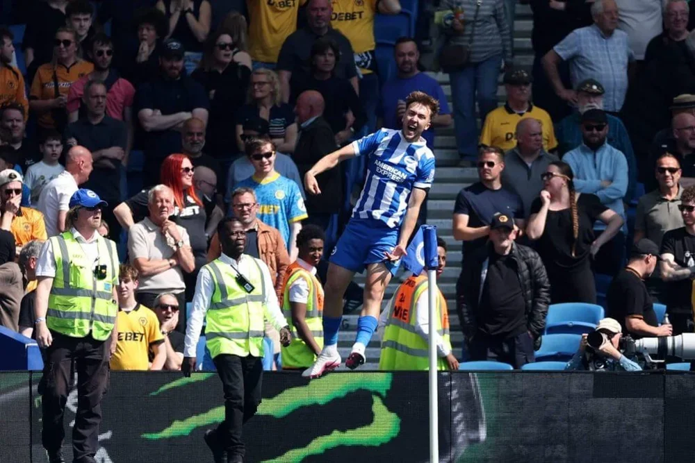 Brighton's Jack Hinshelwood leaps into the air following his goal after 35 seconds against Wolves