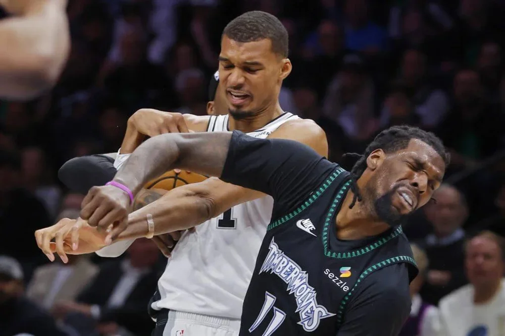 Victor Wembanyama elbows Naz Reid during Game 4.